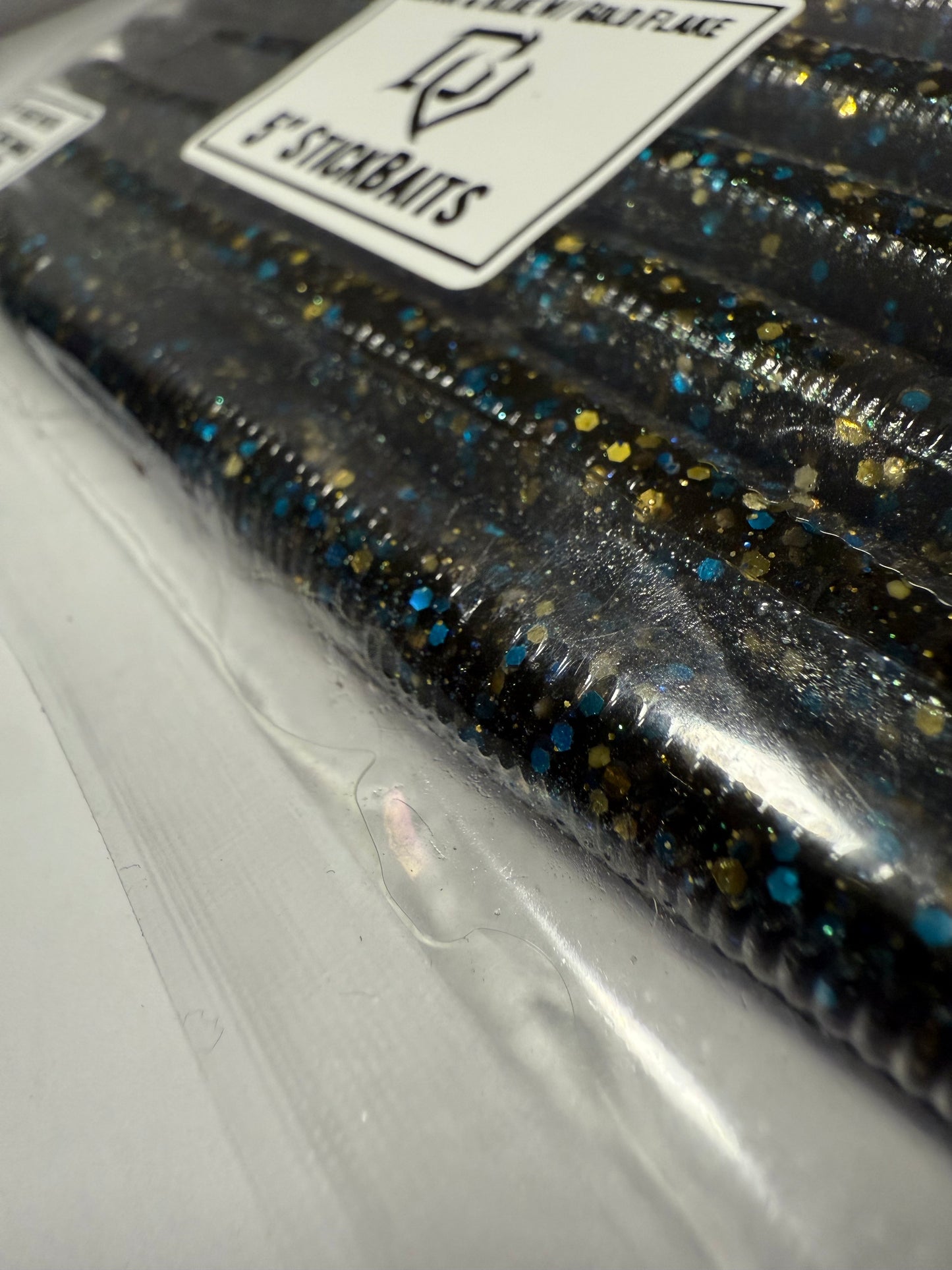 STICKBAITS - “Black&Blue W/ Gold”